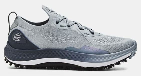 Side view of Stephen Curry's grey and navy golf shoe.